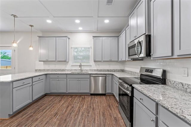 kitchen featuring gray cabinets and stainless steel appliances