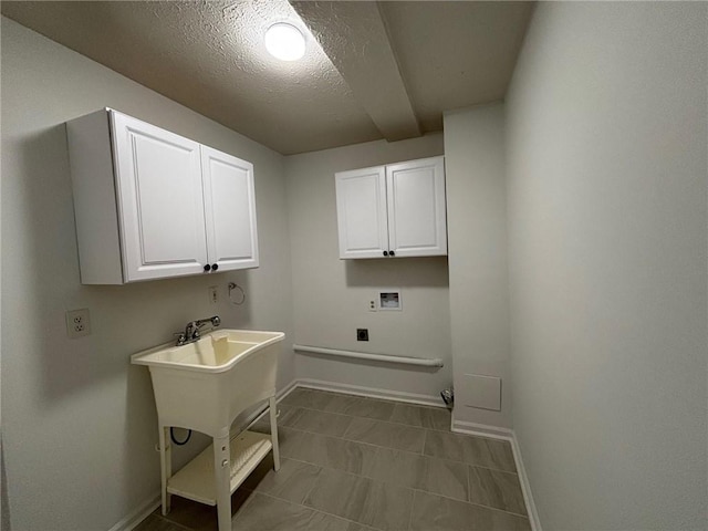 laundry room with cabinet space, hookup for a washing machine, hookup for an electric dryer, and baseboards