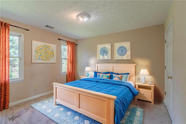 1615 Burnt Oak Way, Dacula, GA 30019 - carpeted bedroom featuring baseboards and a textured ceiling