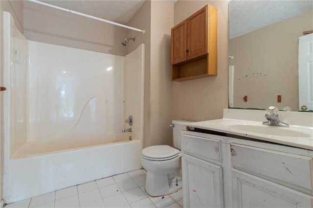 1615 Burnt Oak Way, Dacula, GA 30019 - bathroom featuring vanity,  shower combination, tile patterned floors, and a textured ceiling