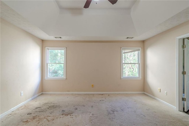 1615 Burnt Oak Way, Dacula, GA 30019 - carpeted spare room with a raised ceiling and a ceiling fan