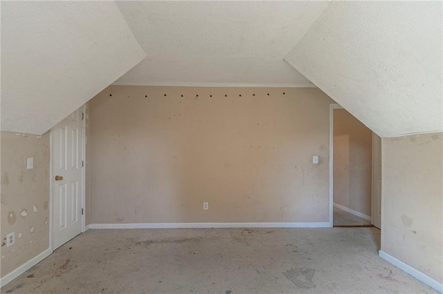 1615 Burnt Oak Way, Dacula, GA 30019 - bonus room with a textured ceiling, vaulted ceiling, and carpet flooring