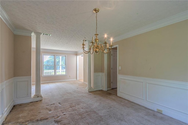 1615 Burnt Oak Way, Dacula, GA 30019 - carpeted spare room featuring a chandelier, decorative columns, a decorative wall, crown molding, and a textured ceiling