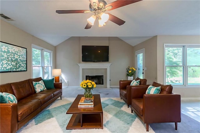 1615 Burnt Oak Way, Dacula, GA 30019 - living area with vaulted ceiling, carpet flooring, plenty of natural light, and a fireplace