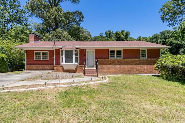 128 Mountain View Dr, Gainesville, GA 30501 - ranch-style house with a chimney, a front yard, and brick siding
