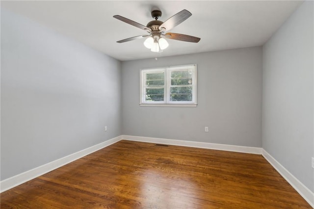 128 Mountain View Dr, Gainesville, GA 30501 - spare room featuring ceiling fan, wood finished floors, and baseboards