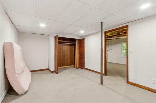 128 Mountain View Dr, Gainesville, GA 30501 - unfurnished bedroom featuring baseboards, a closet, recessed lighting, concrete flooring, and a paneled ceiling