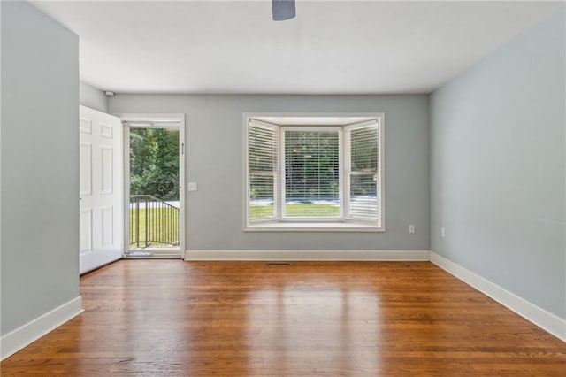 128 Mountain View Dr, Gainesville, GA 30501 - spare room with wood finished floors and baseboards