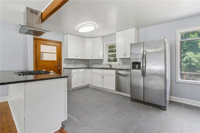 128 Mountain View Dr, Gainesville, GA 30501 - kitchen with stainless steel appliances, island range hood, a sink, decorative backsplash, and healthy amount of natural light