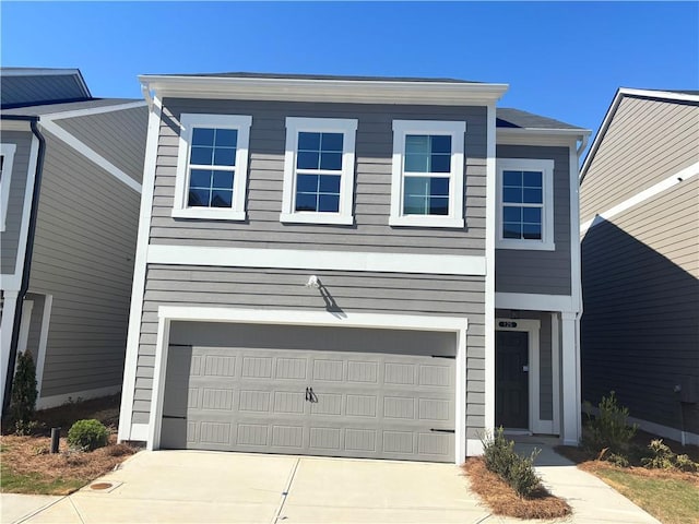 view of front of property with a garage