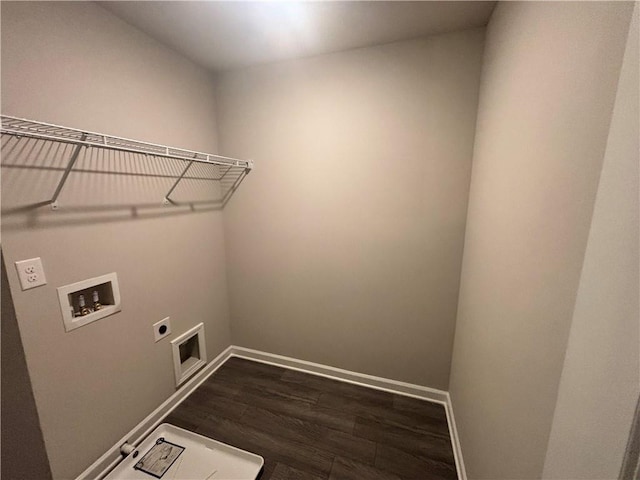 washroom featuring hookup for a washing machine, dark hardwood / wood-style floors, and hookup for an electric dryer