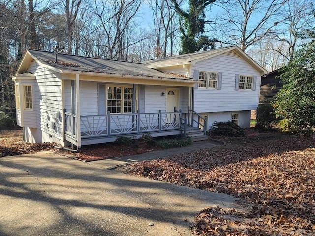 tri-level home featuring a porch