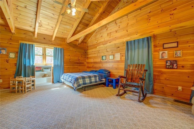 carpeted bedroom featuring ceiling fan, wooden walls, high vaulted ceiling, wooden ceiling, and beamed ceiling