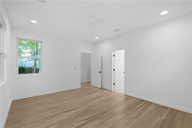 empty room with light wood-type flooring