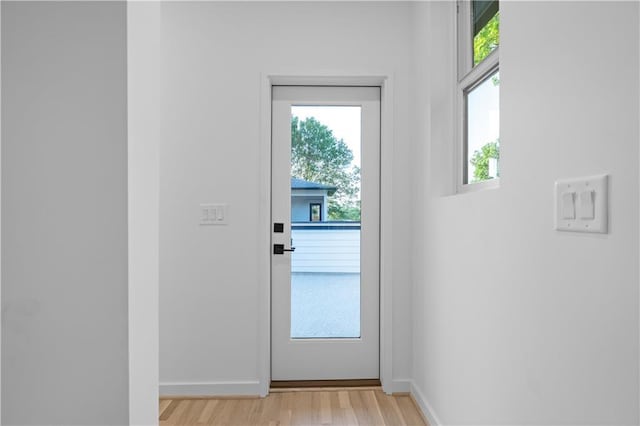 entryway with light wood-type flooring