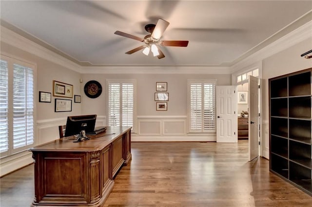 office area featuring crown molding, light hardwood / wood-style floors, and ceiling fan