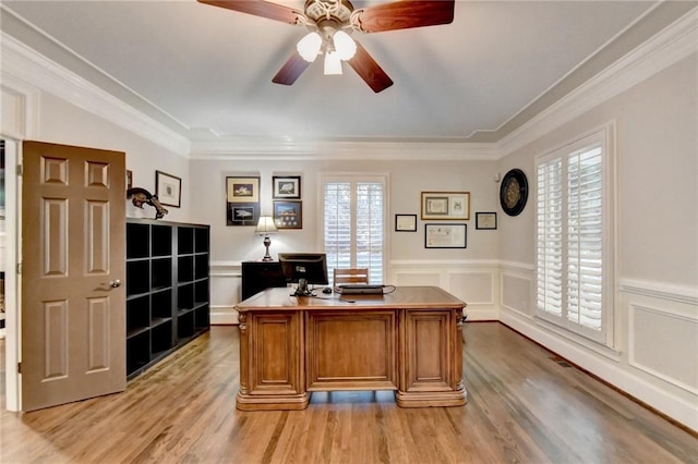 kitchen with built in appliances, premium range hood, sink, a kitchen island, and decorative light fixtures