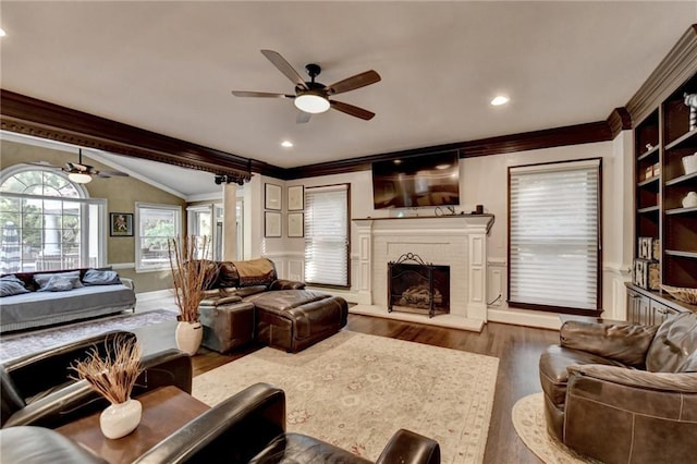 sitting room with ceiling fan, light tile patterned floors, a healthy amount of sunlight, and vaulted ceiling