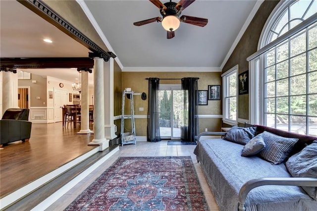 tiled bedroom featuring access to outside, vaulted ceiling, ceiling fan, and ornate columns