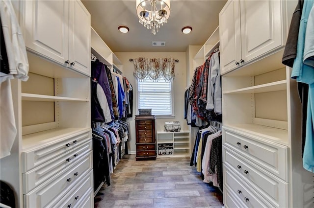 bathroom with vanity, crown molding, and a bathing tub