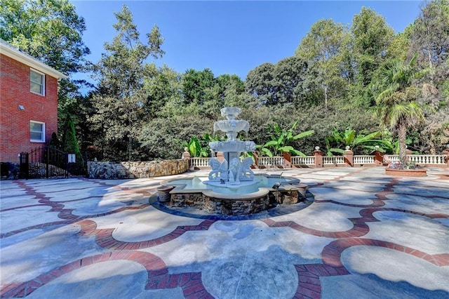 view of property's community with a patio