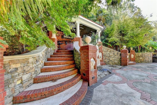 view of pool with a diving board and a patio