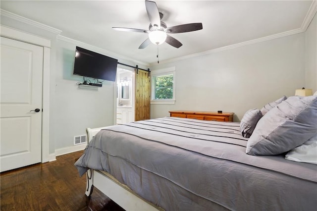 1192 Eastridge Rd SW, Atlanta, GA 30311 - bedroom featuring ornamental molding, a barn door, ceiling fan, and ensuite bath