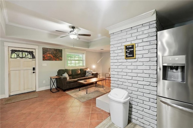 1192 Eastridge Rd SW, Atlanta, GA 30311 - living room with ornamental molding, light tile patterned floors, and ceiling fan