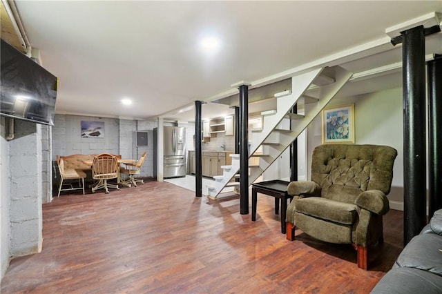 1192 Eastridge Rd SW, Atlanta, GA 30311 - basement featuring hardwood / wood-style flooring and stainless steel fridge with ice dispenser
