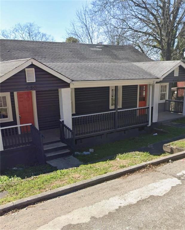 430 E 23rd St, Anniston, AL 36207 - view of front of home featuring covered porch and a shingled roof