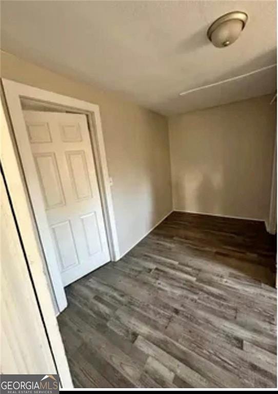 430 E 23rd St, Anniston, AL 36207 - spare room featuring wood finished floors