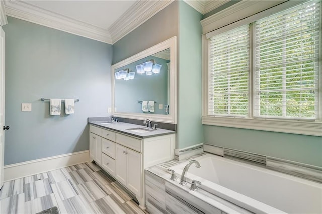 bathroom with crown molding, dual vanity, and a bathtub