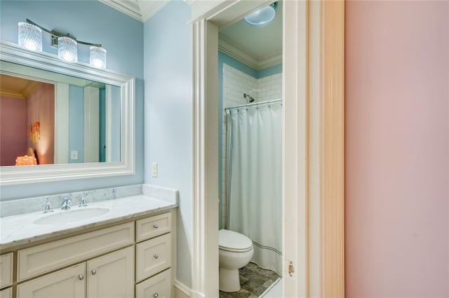 bathroom with tile floors, toilet, ornamental molding, and vanity