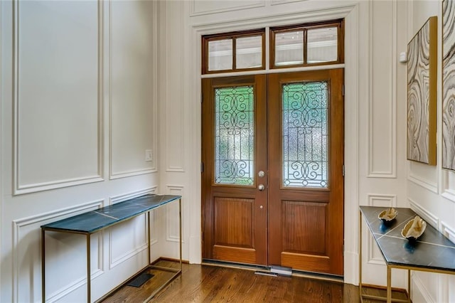 interior space featuring french doors and dark wood-type flooring