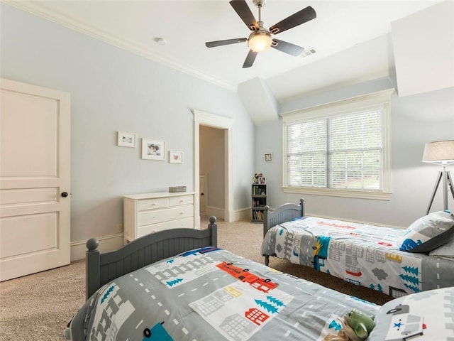 bedroom featuring light colored carpet, ornamental molding, and ceiling fan