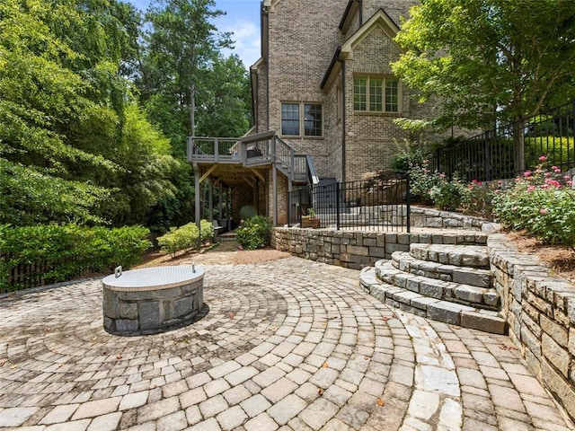 view of patio featuring a fire pit