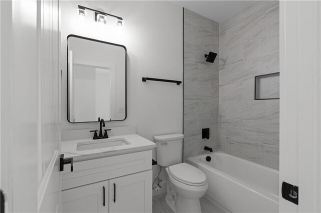 full bath featuring vanity,  shower combination, and toilet