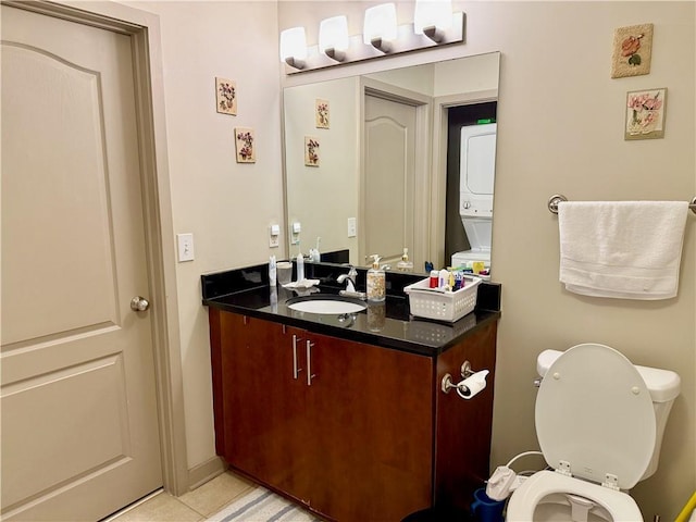 half bathroom featuring toilet, tile patterned floors, and vanity