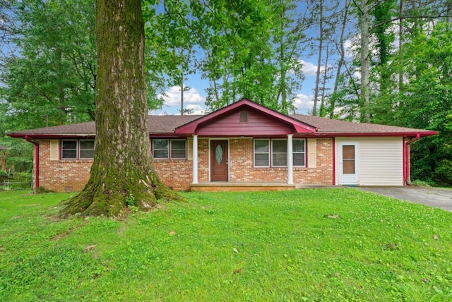 3047 Hudson Ct, Decatur, GA 30033 - ranch-style house featuring a front yard, covered porch, and brick siding