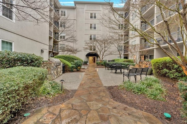 view of home's community with a patio