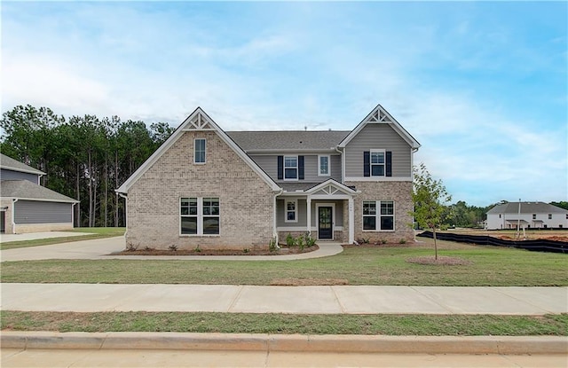 view of front of home with a front yard