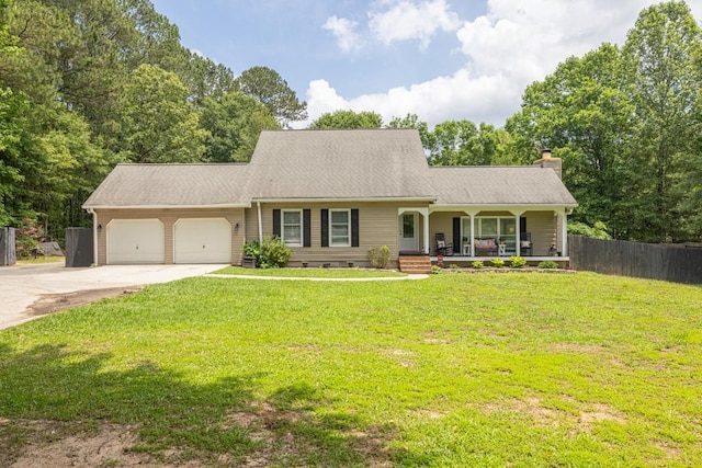 955 Chandler Haulk Rd, Loganville, GA 30052 - view of front of house featuring covered porch, a chimney, a garage, driveway, and crawl space