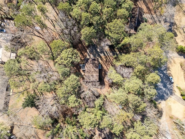 aerial view featuring a forest view