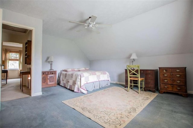 carpeted bedroom featuring ceiling fan and lofted ceiling