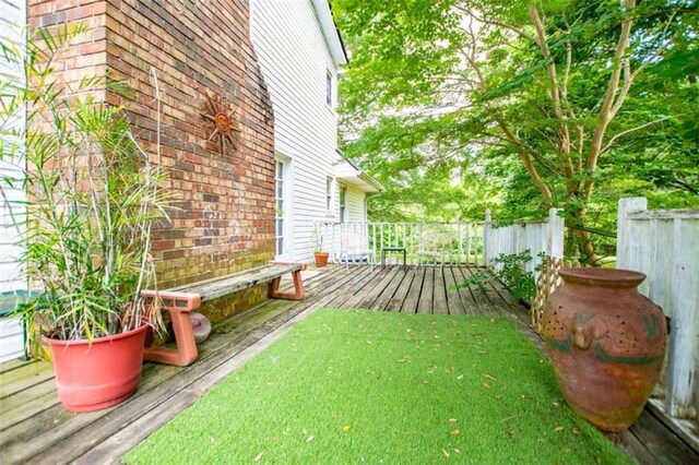 view of yard featuring a wooden deck