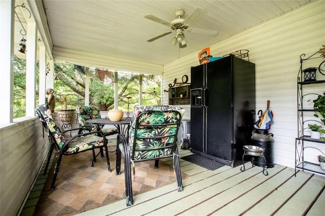 deck with a porch and a ceiling fan