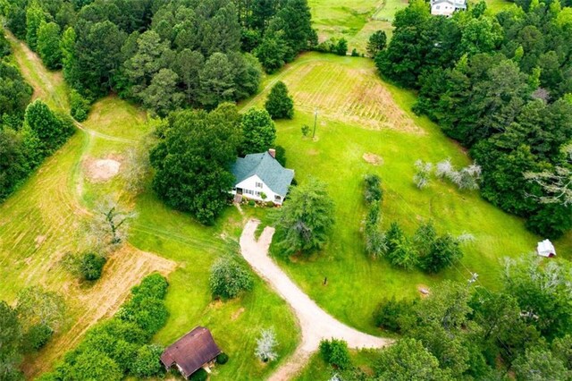 birds eye view of property featuring a rural view