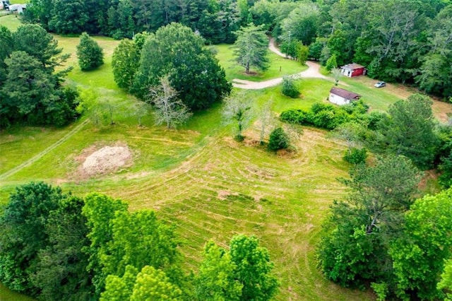 birds eye view of property featuring a rural view