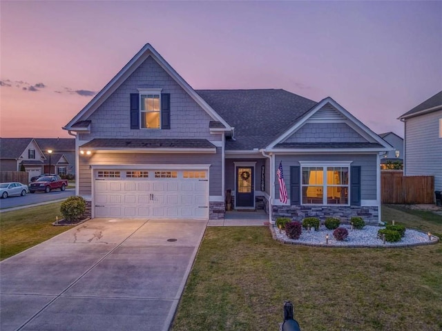 40 Stadelman Ct, Cartersville, GA 30120 - craftsman inspired home featuring a garage, stone siding, concrete driveway, and roof with shingles