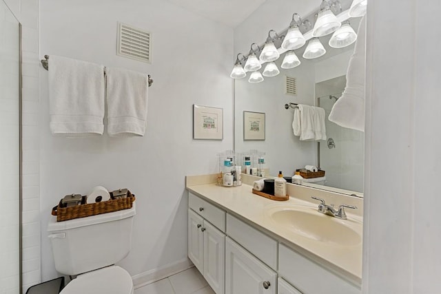 full bathroom with toilet, vanity, visible vents, and tile patterned floors